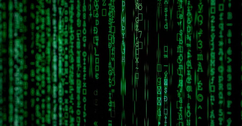 Abstract green matrix code background with binary style representing cybersecurity.
